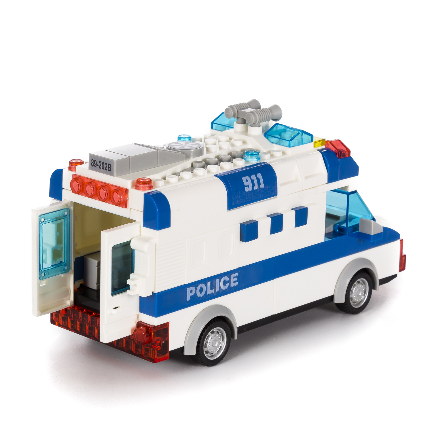 DAM. Furgón de policía SWAT con luces y efectos de sonido. Para construir, 77 piezas. Funcionamiento por inercia de retroceso. 18x7,5x9cm