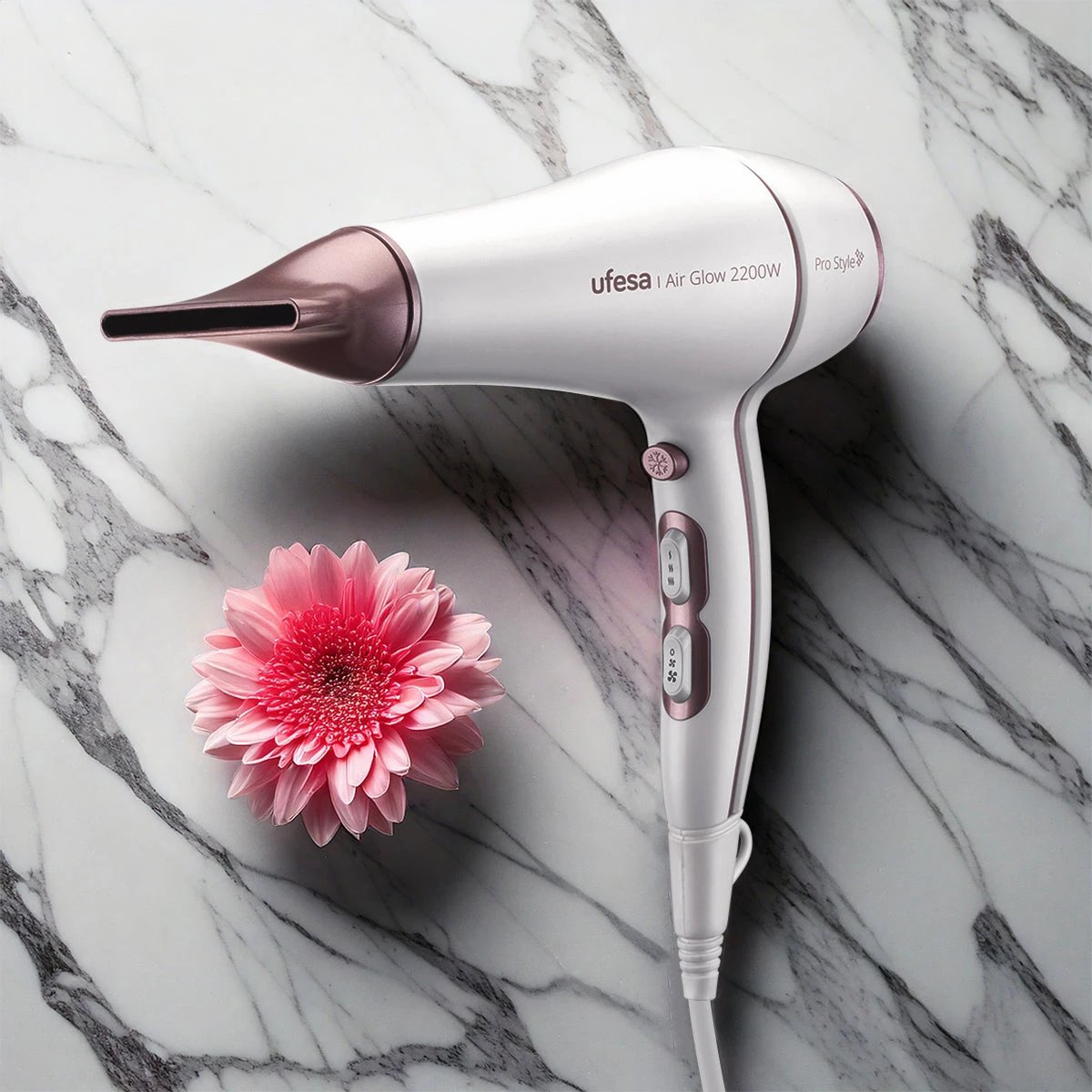 UFESA - Secador de pelo AirGlow 2200W con motor AC, 2 velocidades y 3 temperaturas, tecnología iónica y golpe frío, color rosa y blanco