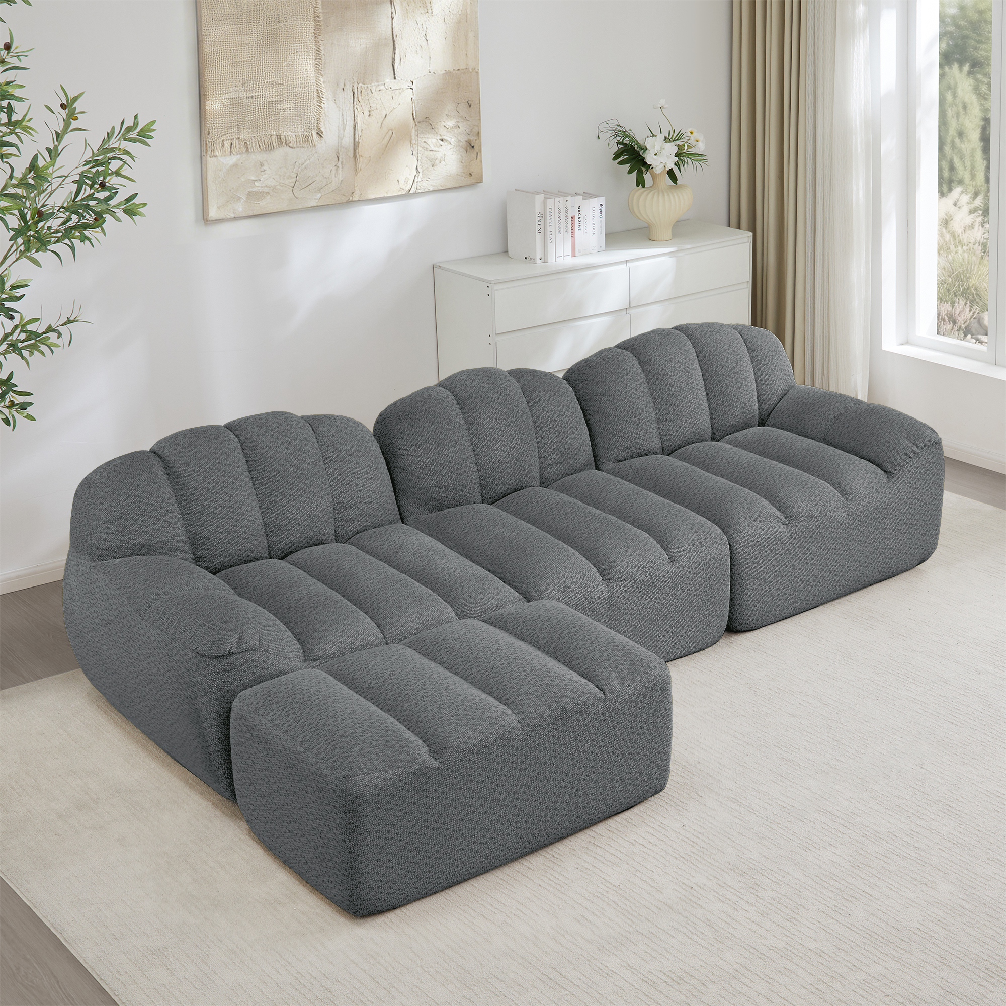 Canapé modulable 3 places en L gris avec ottoman, sans structure rigide et assise profonde
