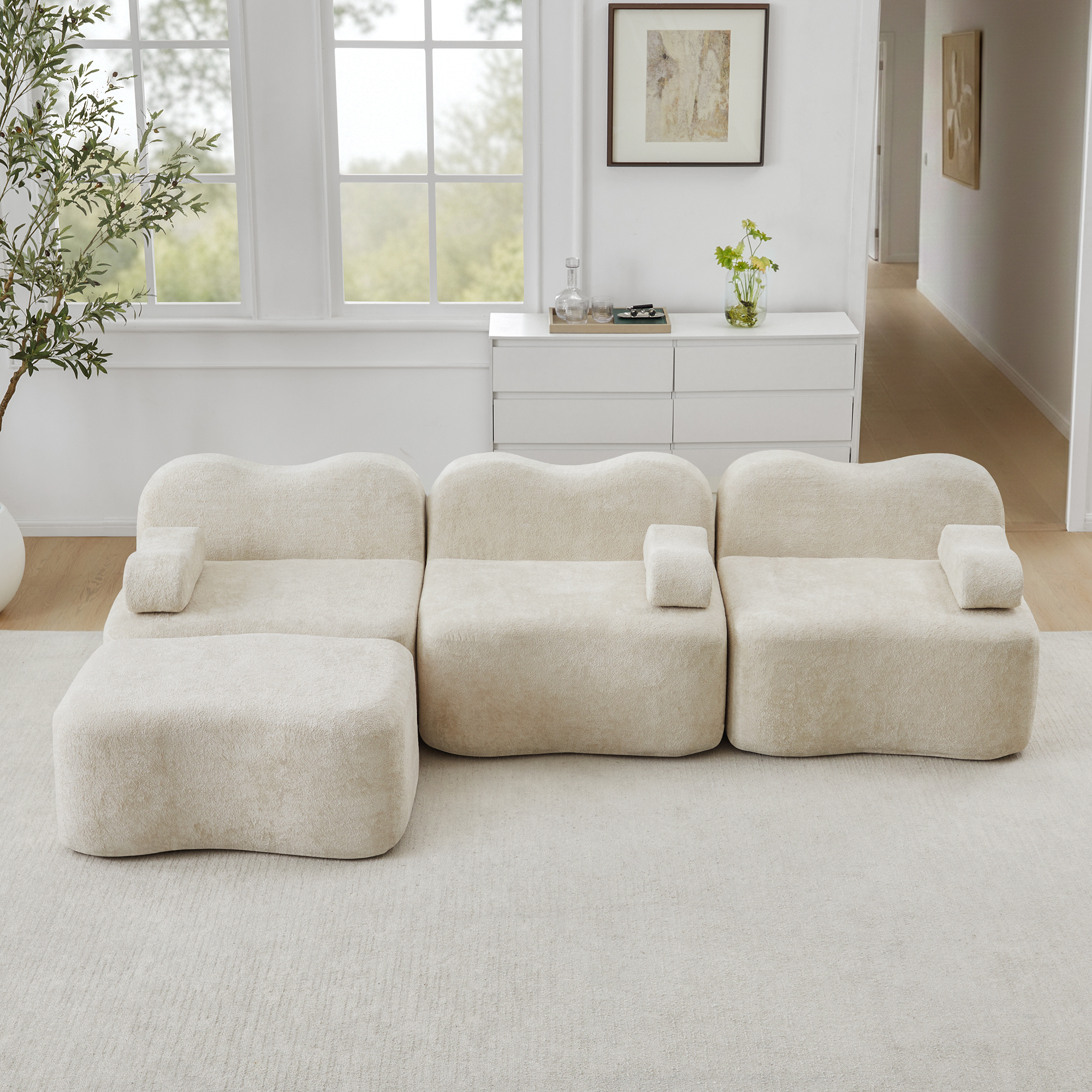Canapé modulaire 3 places en L beige avec ottoman, assise profonde et forme ondulée
