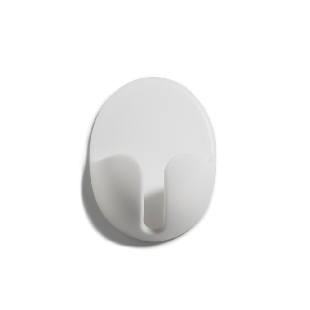 SOPORTE ADHESIVO PARA ENCHUFE BLANCO