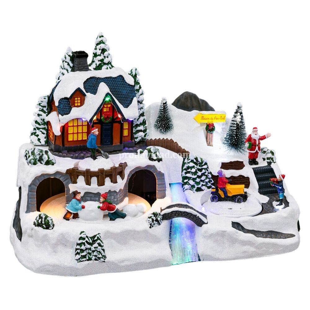 Pueblo de navidad "Chefchaouen" | Escena navideña luminosa con niños jugando delante de la casa de Papá-Noel | 37.5x21.5x25.5 cm