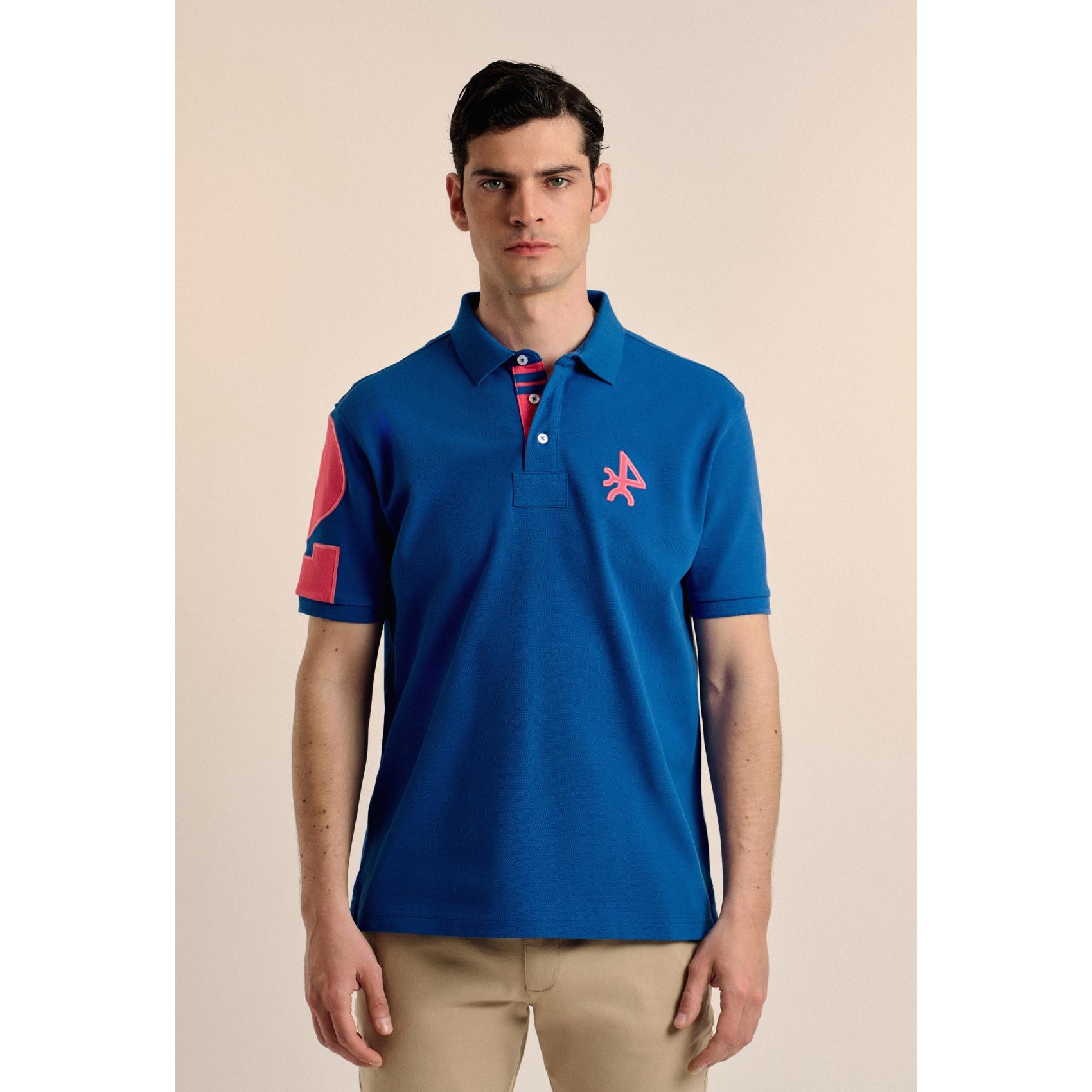 Polo Valecuatro modelo número azul