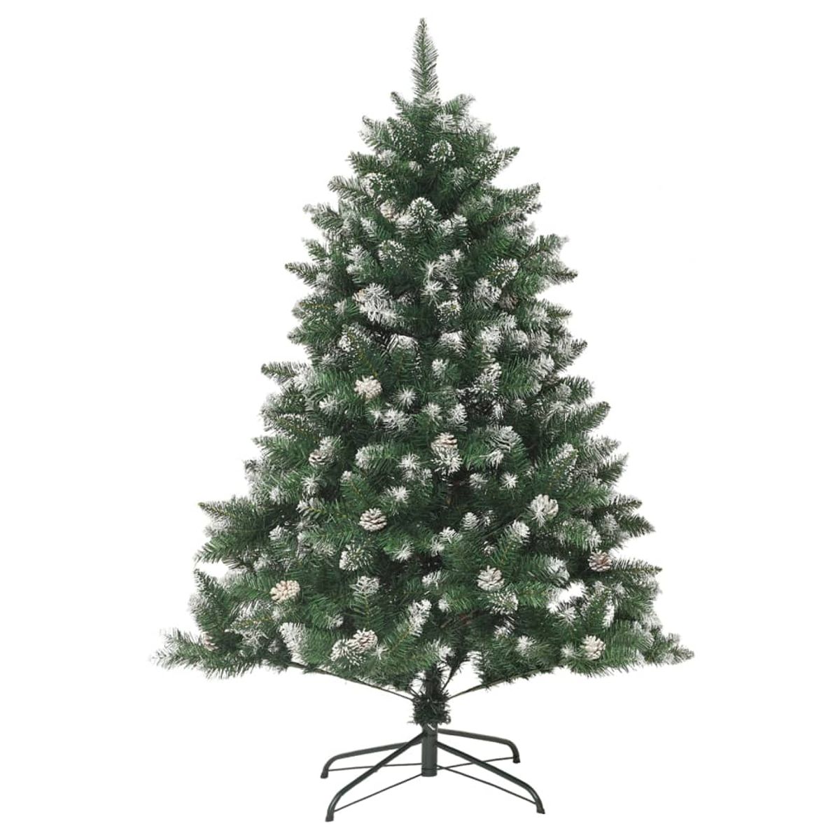 Árbol de Navidad nevado con piñas verde