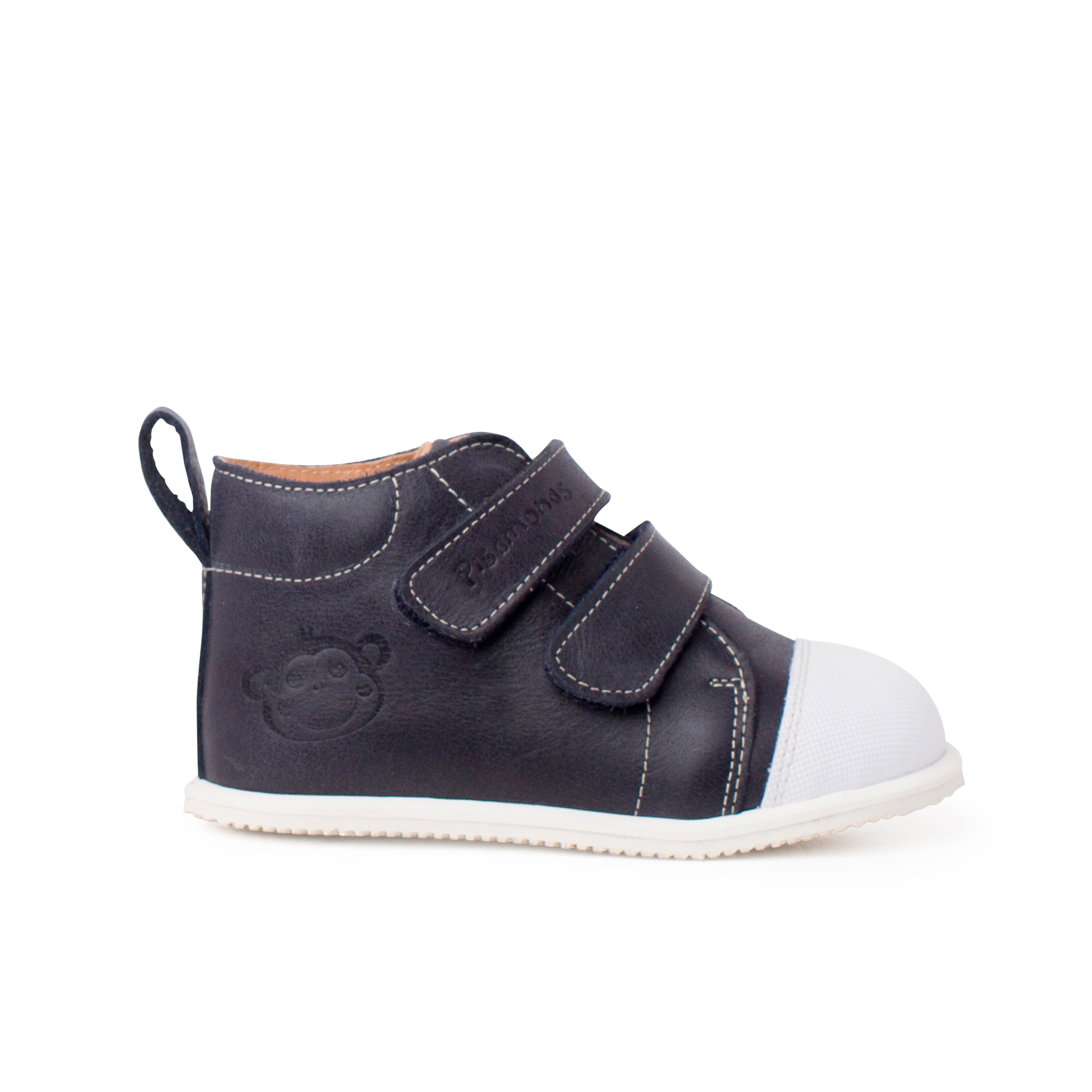 Pisamonas botita piel sport puntera blanca