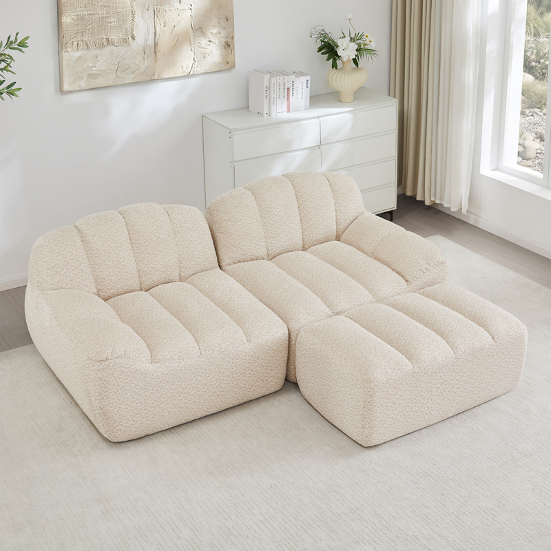 Canapé modulaire beige blanc en forme L avec ottoman et assise profonde