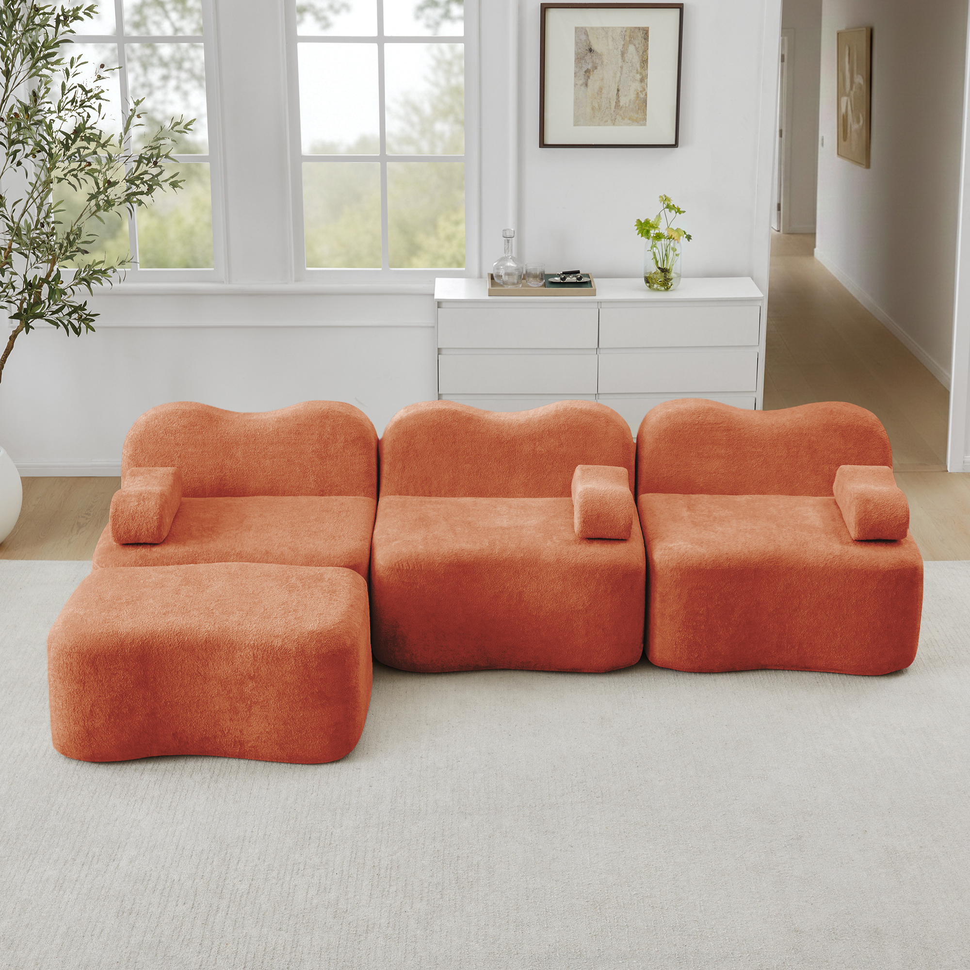 Canapé modulaire 3 places en L orange avec ottoman, assise profonde et forme ondulée