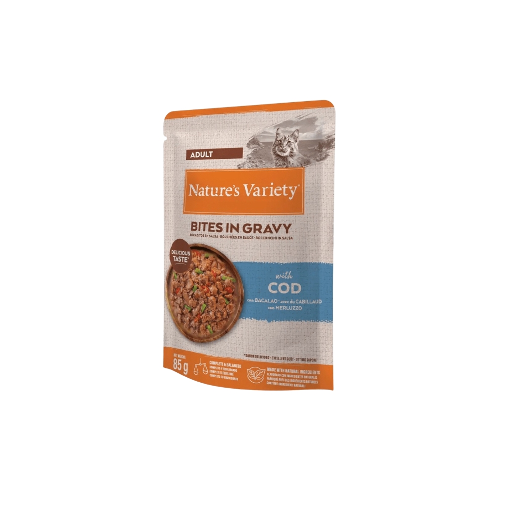NATURE´S VARIETY Bites in Gravy (85 gr) - Comida Húmeda para Gatos Adultos Cocinada al Vapor (Salmón, Pollo, Pavo, Atún, Bacalao ó Pescado del Océano)