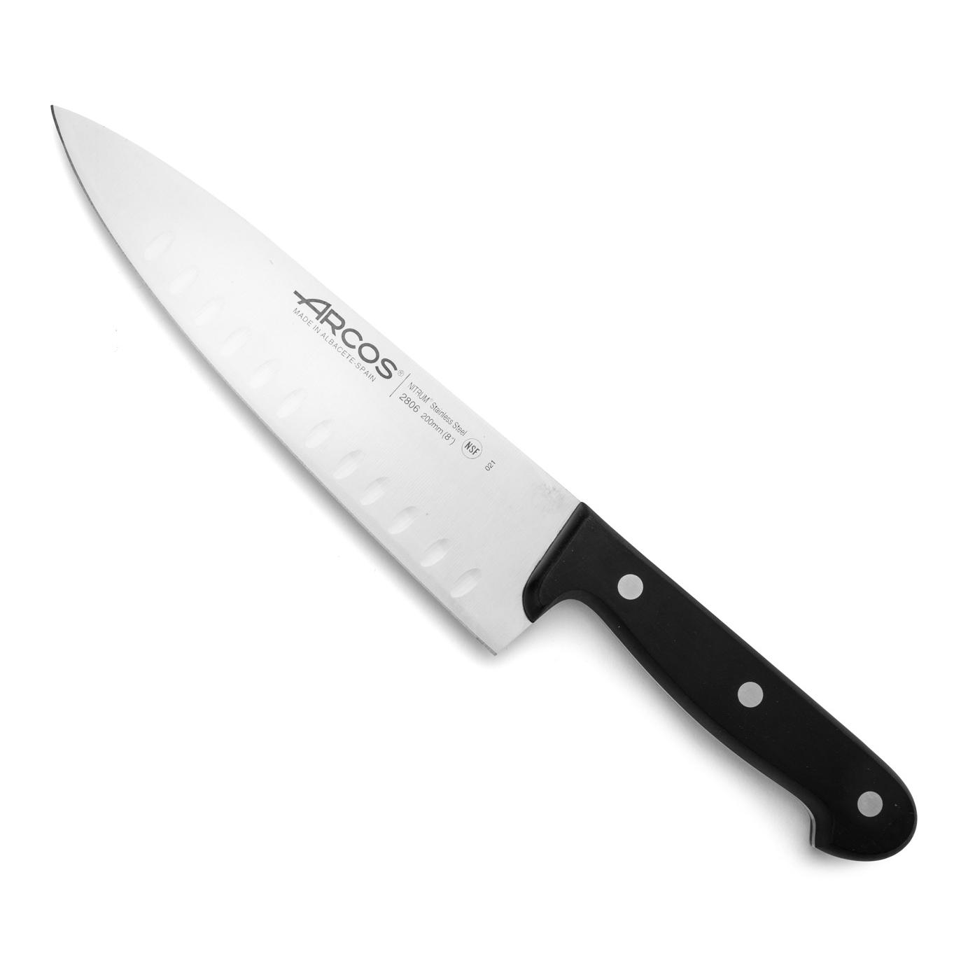 Arcos Cuchillo Chef Granton Acero Inoxidable. Cuchillo cocina para cortar y pelar alimentos pequeños. Mango ergonómico polioximetileno y Hoja 200 mm. Serie Universal. Color negro.