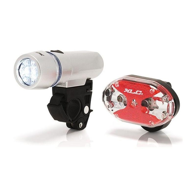 XLC - Set de luces LED delantera Triton y trasera Thebe CL-S03 para bicicleta, 5 luces blancas ultrabrillantes + 1 roja, 60 h modo intermitente, soporte ajustable 25,4–31,8 mm, pilas AAA incluidas